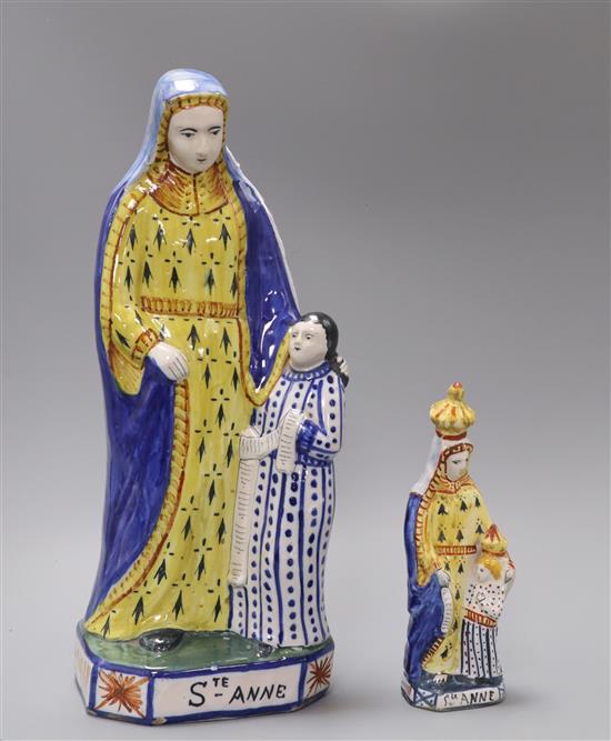 A Faience pottery model of St Anne and a similar smaller one tallest 33cm